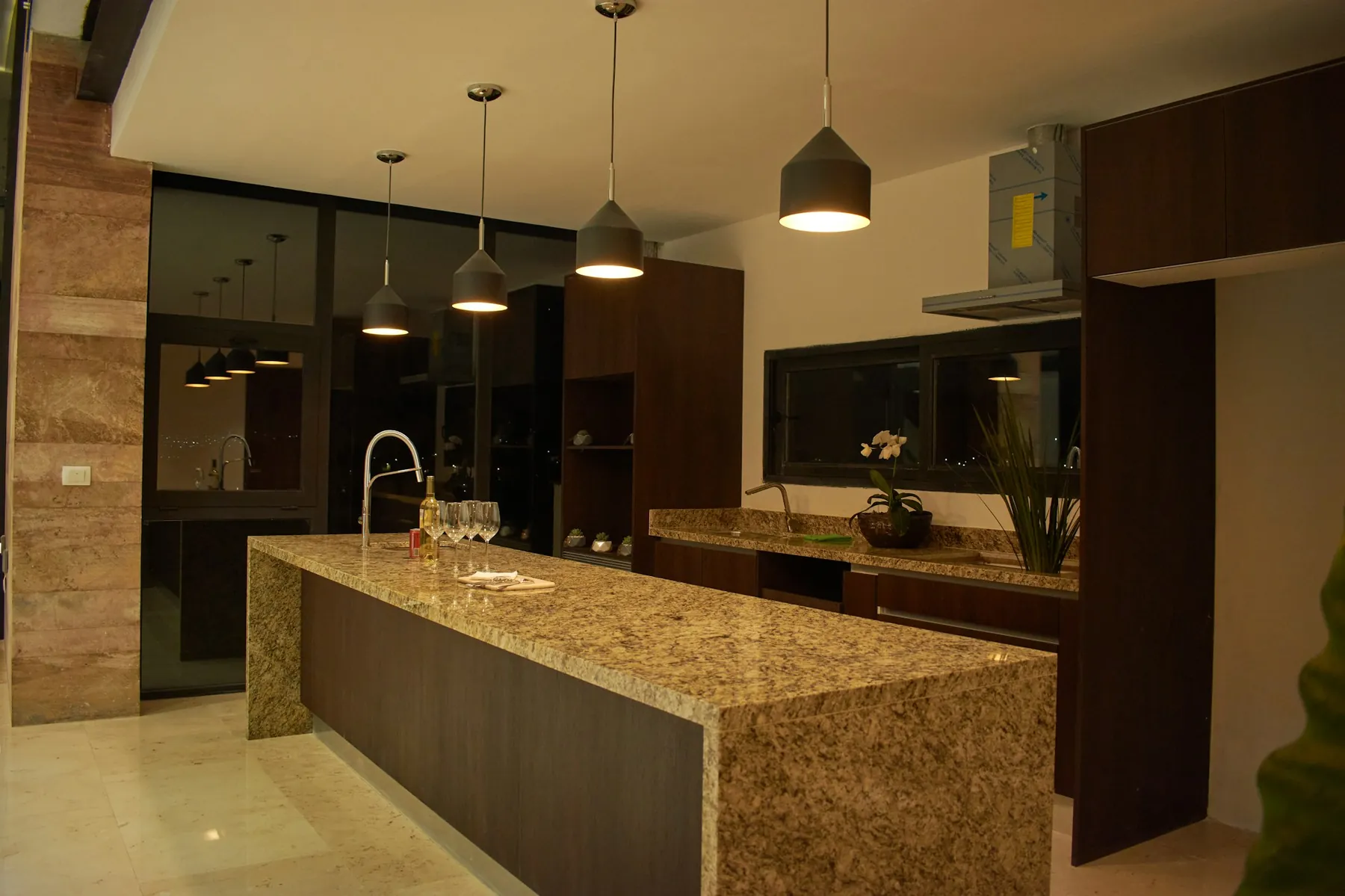 Large kitchen with granite countertop